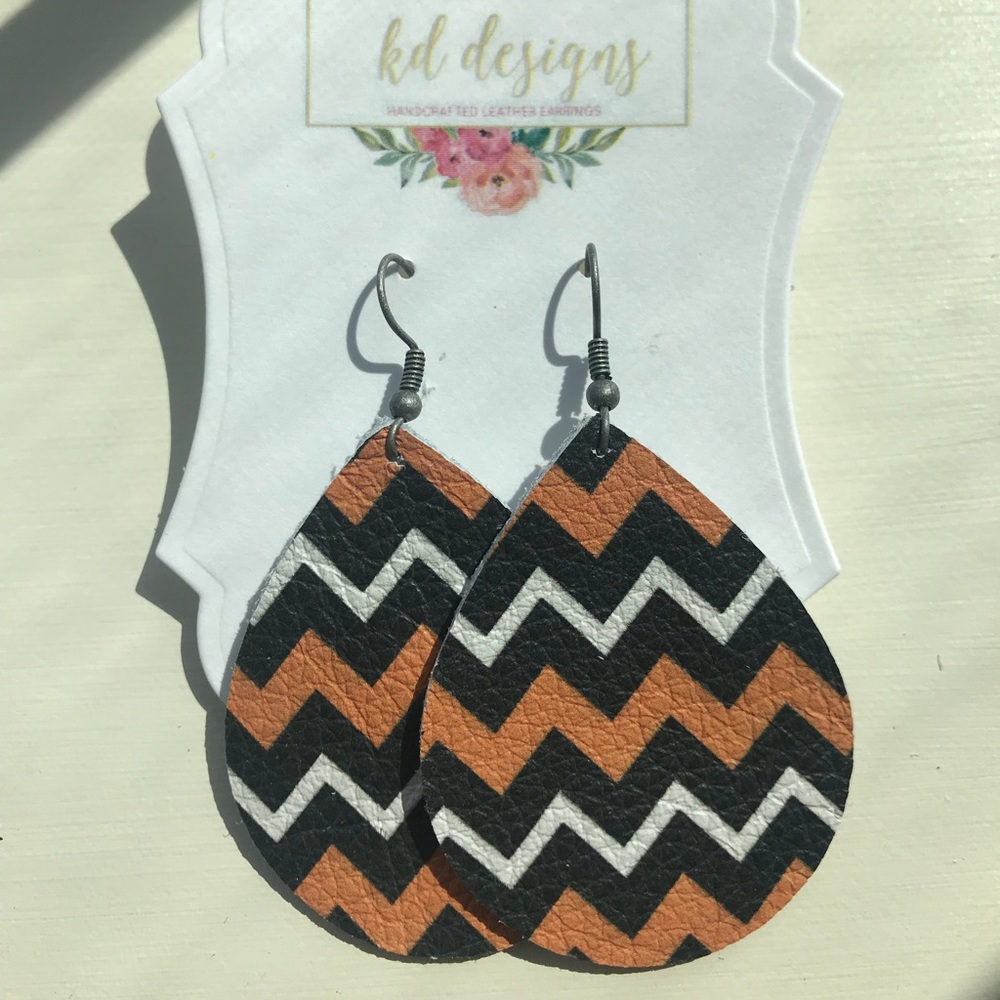Black/orange/white zigzag leather earrings